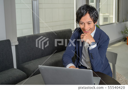 Businessman who is doing well 55540420