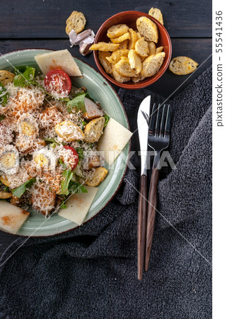 Close-Up Caesar salad with quail egg Close-Up Caesar salad with quail egg 55541436