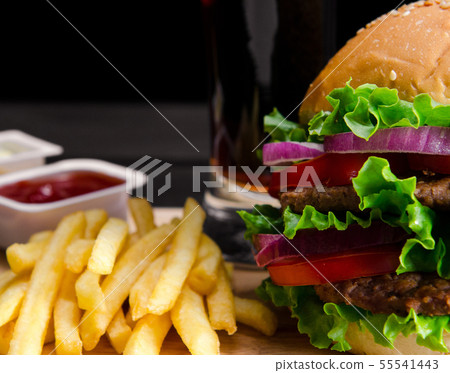 Burger served in bun in nutrition fast food concept 55541443