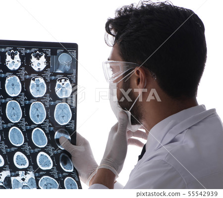 Young doctor looking at x-ray images isolated on white 55542939