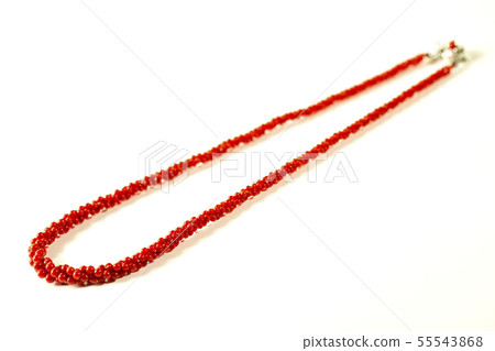 Three red necklaces and white background Three red necklaces and white background 55543868