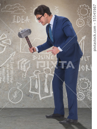 Bad angry boss threatening employee with hammer Bad angry boss threatening employee with hammer 55545987