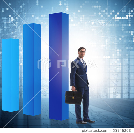 Young businessman in business concept with bar charts 55546208