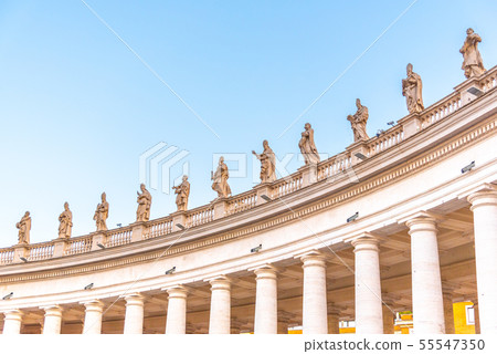 Doric Colonnade with statues of saints on the top. St. Peters Square, Vatican City 55547350