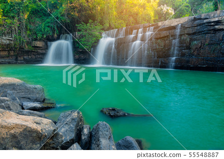 Beautiful waterfall with sunlight in jungle. Sri 55548887