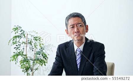 Grumpy mature man 55549272