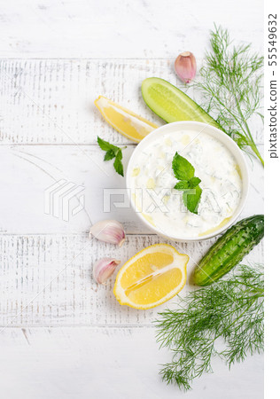 Greek dip sauce or dressing tzatziki Top view 55549632