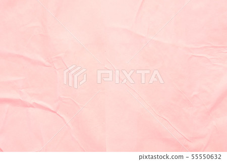 coral pink wet paper wrinkled texture background 55550632