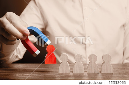 The businessman draws a red figure from the team The businessman draws a red figure from the team 55552063