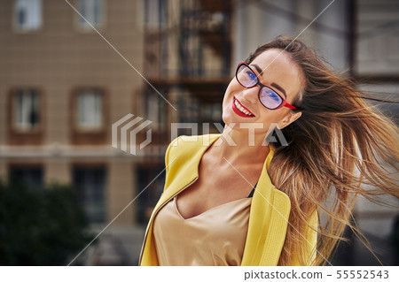 Portrait of a young beautiful laughing woman with Portrait of a young beautiful laughing woman with 55552543