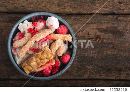 sweetmeat made of many ingredients. 55552916