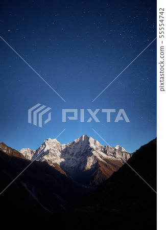 Thamserku mountain night view in the light of the rising Moon. 55554742