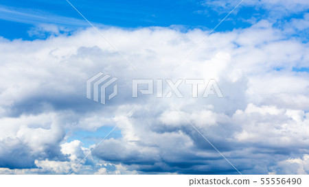 low cumulus white clouds in blue sky on summer day low cumulus white clouds in blue sky on summer day 55556490