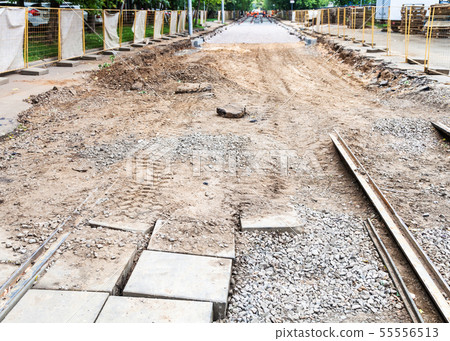 broken old tram road and laying of new rails broken old tram road and laying of new rails 55556513