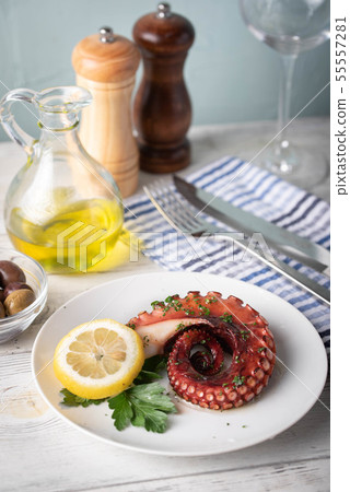 greek grilled octopus on white plate greek grilled octopus on white plate 55557281