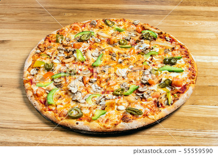 pizza on the wooden background 55559590