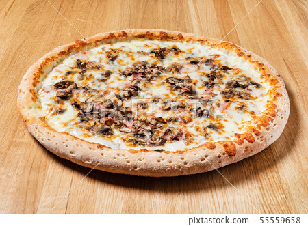 italian pizza on the wooden background italian pizza on the wooden background 55559658