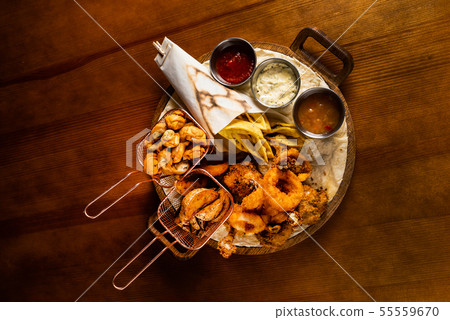 beer plate on the wooden background 55559670