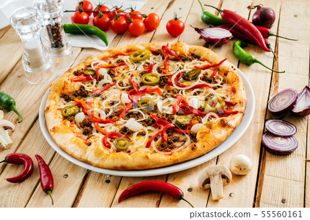 tasty italian pizza with fresh ingredients 55560161