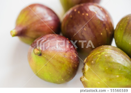 fresh fruits - organic figs on the white background 55560389
