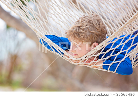 kid at tropical vacation kid at tropical vacation 55565486
