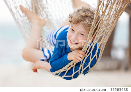 kid at tropical vacation kid at tropical vacation 55565488