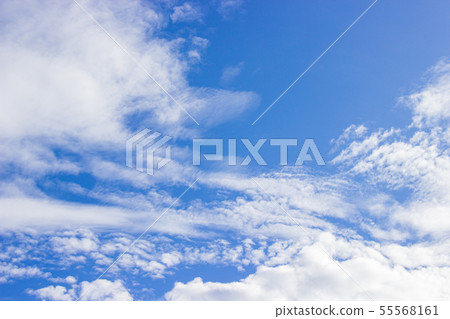 The vast sky is bright and beautiful white clouds. 55568161