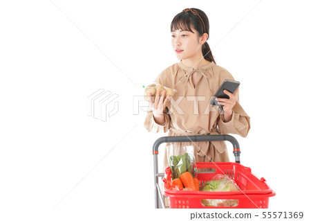 Young woman supervising the origin of food Young woman supervising the origin of food 55571369