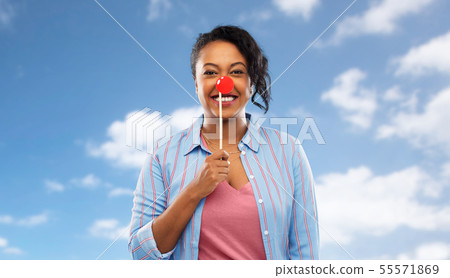 happy african american woman with red clown nose happy african american woman with red clown nose 55571869