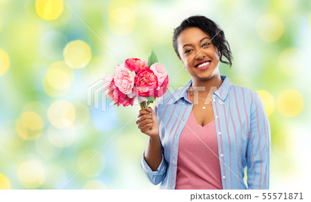 happy african american woman with bunch of flowers happy african american woman with bunch of flowers 55571871