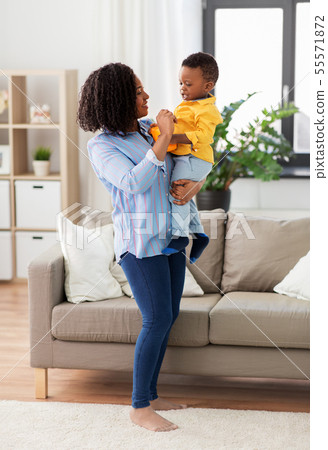 happy african american mother with baby at home happy african american mother with baby at home 55571872