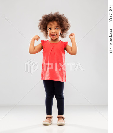 happy little african american girl showing power happy little african american girl showing power 55571873