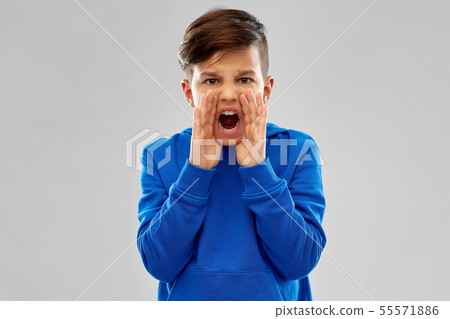 angry boy in blue hoodie shouting 55571886