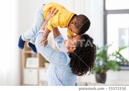 happy african american mother with baby at home 55572530