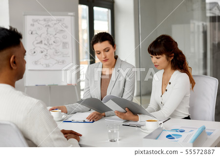 recruiters having job interview with male employee 55572887