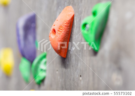close up of rock holder on indoor climbing wall close up of rock holder on indoor climbing wall 55573102