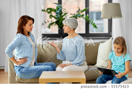 daughter, mother and grandmother arguing at home daughter, mother and grandmother arguing at home 55575423