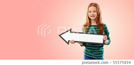 smiling red haired girl with arrow showing to left smiling red haired girl with arrow showing to left 55575834