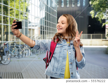 teenage student girl taking selfie by smartphone 55576222