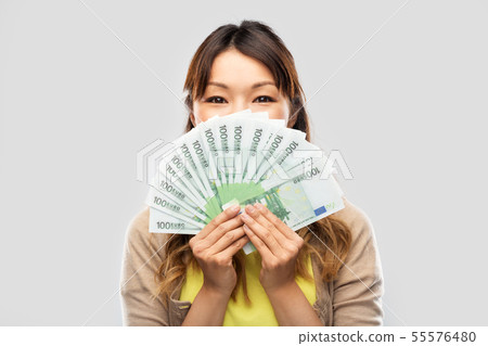 asian woman with hundred euro money banknotes asian woman with hundred euro money banknotes 55576480