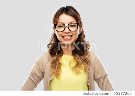 happy asian woman in glasses or student happy asian woman in glasses or student 55577263