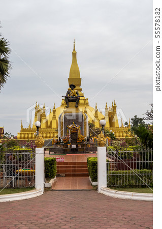 The golden Pagoda at Wat Pha That Luang Temple in The golden Pagoda at Wat Pha That Luang Temple in 55578182