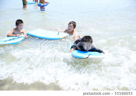 Children surfing 55580055