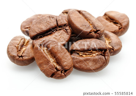 Roasted coffee beans isolated on white Roasted coffee beans isolated on white 55585814