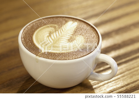 High Angle View Of Coffee On Wooden Table High Angle View Of Coffee On Wooden Table 55588221