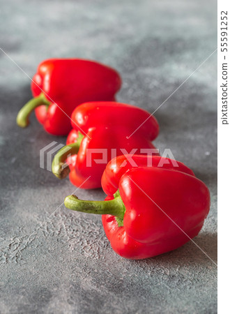 Fresh red peppers close up Fresh red peppers close up 55591252