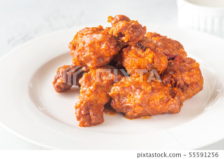 Bowl of buffalo wings Bowl of buffalo wings 55591256