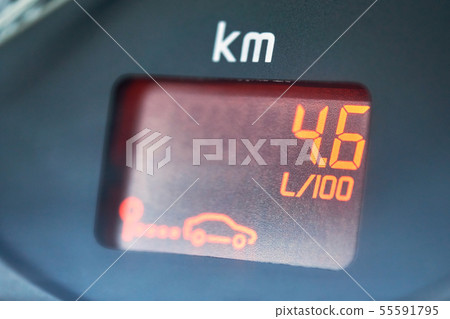 Low fuel consumption showed by the car on-board computer on the dashboard Low fuel consumption showed by the car on-board computer on the dashboard 55591795