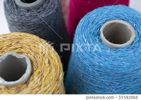 Multi-colored bobbins of wool yarn for hand and machine knitting Multi-colored bobbins of wool yarn for hand and machine knitting 55592068