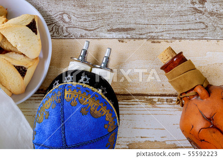 Jewish holiday Purim with carnival mask and 55592223